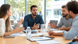 © niwat - Multiracial business professionals discussing in meeting at office