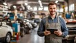 © pkproject - Professional Mechanic Standing in Auto Repair Garage with Digital Tablet