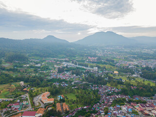 Aerial drone view of greenery countryside scenery in Berastagi, North Sumatra, Indonesia. 