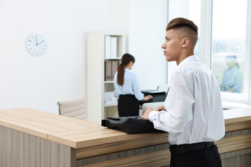 Sticker - Professional receptionist and client in modern office