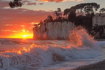 Wall Mural - Sunset Over a Rocky Coastline with a Crashing Wave