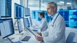 © yailek - A focused doctor in a lab coat analyzes data on multiple monitors in a modern medical facility.