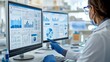 © yailek - Analyst reviewing data on multiple monitors in a modern laboratory, wearing gloves and a mask for safety.