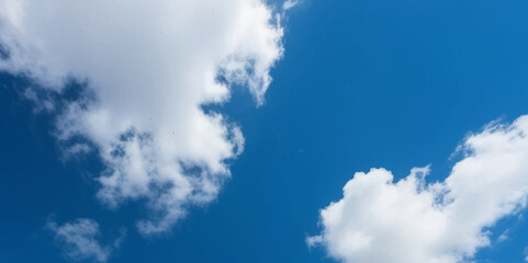 Wall Mural - Natural and cloudy fresh blue sky background. Natural sky beautiful blue and white texture background. blue sky with cloud. sky with white clouds as background or texture	