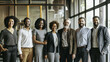 © Swaroop - A diverse group of men and women executives standing together in a modern office, each representing different ethnic backgrounds, symbolizing inclusivity in corporate leadership.