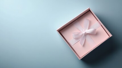 An open pink gift box with a ribbon inside is positioned against a light blue background, creating a visually appealing and inviting image.