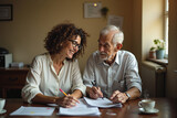 Social worker assisting elderly man with forms in office