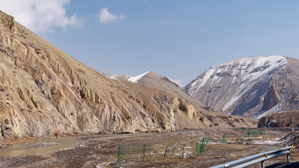 View from the highway of the stunning mountains and arid landscape near the Nepal - Tibet, China border 