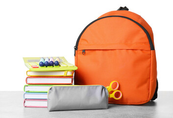 Poster - Backpack with different school stationery on light grey table against white background