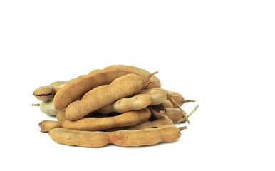 Wall Mural - Closeup of Ripe Tamarind Heap  Isolated on White Background with Copy Space