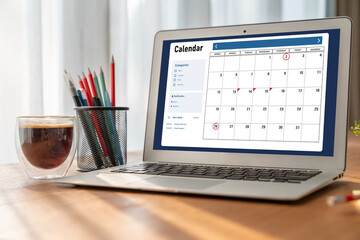 Wall Mural - Calendar on computer software application for modish schedule planning for personal organizer and online business