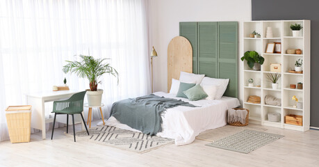 Wall Mural - Interior of light bedroom with shelf unit, plants and table