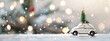 © Irina - Toy white car with Christmas tree on snowy table on blurred garland lights background. Concept for Christmas, New Year, winter holidays. Banner with copy space. Winter festive composition.