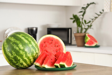 Poster - Fresh watermelon on table in kitchen, closeup