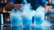 © AminaDesign - Explore the magical realm of liquid nitrogen cocktails, with vibrant colors and swirling fog, offering a delightful and captivating drinking experience to enjoy with friends and loved ones