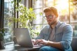 © kitipol - High-resolution brightly lit photorealistic candid photograph of a confident young marketer in casual attire, focused on his laptop in a sunlit office. The photograph is styled like a high-end