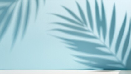 Wall Mural - blurred palm leaves shadow on the light blue wall