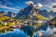 © kittipon - Dramatic mountain peaks rise behind a serene fjord and quaint village, set against a brilliant blue sky, in picturesque Reinebringen, Lofoten, Norway.