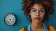 © Tuong - African American Teen Student with Backpack and Clock on Blue Wall Background - Education in High School/University/College Concept