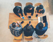 © aFotostock - Top view of Multi Ethnics Teamwork Collaboration Team Meeting Communication concept Conference Room. Diversity Partner Business Meeting brainstorming hand holding mobile laptop smartphone technology