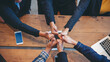 © aFotostock - Diverse multiethnic Partners hands together teamwork group of multiracial people meeting join hands togetherness. Diversity people hands join empower partnership teams connection volunteer community