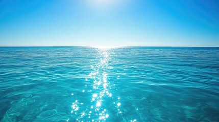 A pristine crystal sea with turquoise waters, sparkling in the sunlight, with a distant horizon blending with the sky.