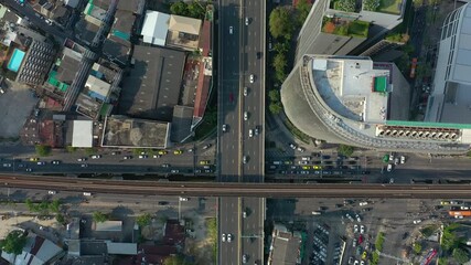 sunny day flight over bangkok city center traffic street road aerial topdown panorama 4k thailand