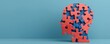 © PoyTumStudio - Creative puzzle head sculpture representing problem solving and cognitive development on a blue background.
