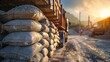 © MahmudulHassan - Cement bag stack on truck site, construction concept