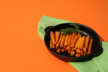 Fried carrot, concept of tasty fried food