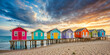© tomertu - image of colorful beach houses at the seashore