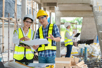 Wall Mural - Group architect team on construction site inspection documents and business workflow in the morning.