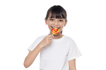 Happy Asian girl eating colorful lollipops or candy sweets isolated on white background with clipping path.