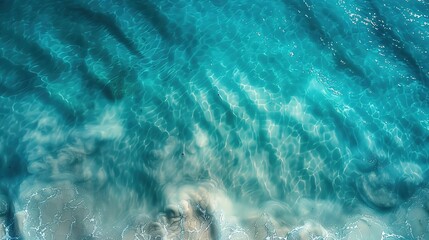 Wall Mural - top view at a calm clear blue sea water background. blue azure sea water texture