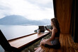 © Cavan Images - Remote work with scenic mountain and lake view in Guatemala
