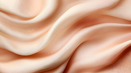 Wall Mural - Smooth, flowing fabric in soft peach tones, showcasing texture.