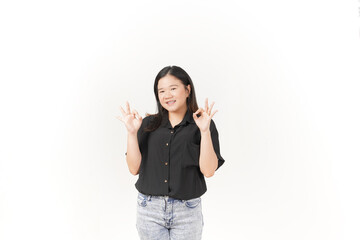 Young Asian woman showing okay sign wearing Black t-shirt and jeans isolated on white background