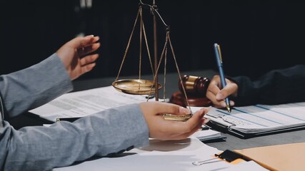 Wall Mural - Business and lawyers discussing contract papers with brass scale on desk in office. Law, legal services, advice, justice and law concept picture with film grain effect