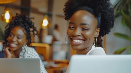 Aufkleber - Two happy African American businesswomen using laptops with smiling female consultant Expressing joy surprise Working together Online business concept in finance marketing : Generative AI