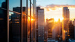 © wuttichai1983 - The golden hues of the setting sun illuminate the glass facades of tall buildings, capturing the serene beauty of urban architecture at dusk.