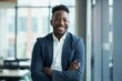 © Andrii Zastrozhnov - Fashionable and stylish businessman in a suit, smiling confidently in an office portrait, exuding success and leadership.