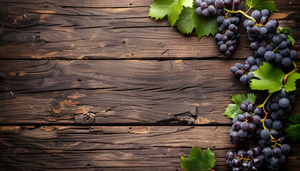 Ripe grapes on wooden background, copy space for text