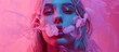 © Maxim Borbut - Stock photo of a beautiful woman isolated on pink smoke background.