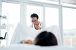 © peopleimages.com - Gynecologist, thinking and patient with checkup at clinic for pelvic exam, pap smear or vaginal examination. Gynecology, women and medical assessment, abortion planning and treatment risk at hospital