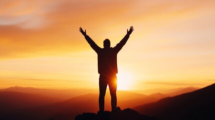 Canvas Print - Silhouette of a person with raised arms, worshiping at sunrise on a hilltop, with a radiant sky in the background 