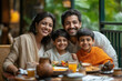 © sharafmaksumov - Happy Indian Family Breakfast