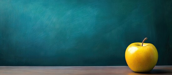 Poster - corner of an empty school chalkboard with a yellow apple beside it. with copy space image. Place for adding text or design