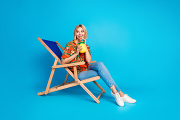 Poster - Photo of cute lovely nice girl wear trendy print clothes chill look empty space isolated on blue color background