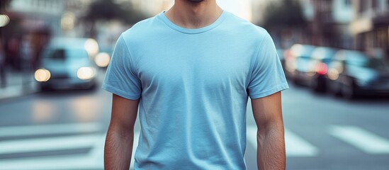 Aufkleber - Close up of a young man in a light blue t shirt standing at a crosswalk. with copy space image. Place for adding text or design