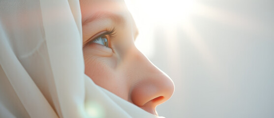 Poster - Close-up of a woman's eye and nose, looking into the distance